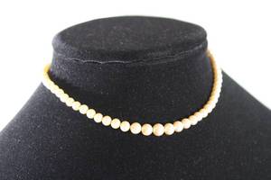 lot 93 image: Jewelry Sterling Silver toddlers faux pearl strand. Clasp marked Sterling. 12L