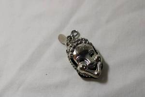 lot 95 image: Jewelry Sterling Silver signed 1940s Dane craft dual sided Comedy  Tragedy theater pendant. Marked Sterling Dane craft. Length 1 58 x Width 1316 x Depth 38.