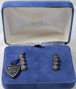 lot 96 image: Jewelry Sterling Silver signed Beverly Hills Silver laser cut earrings. Marked Sterling Silver Beverly Hills Silver. In box. Approx. 1L (Gold version available in lot 47)
