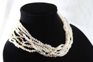 lot 151 image: Jewelry  Sterling Silver signed Ross Simons 8 strand cultured freshwater 5-6MM Keshi pearl torsade necklace. Marked 925. 14L w 4 extender. In box w pouch