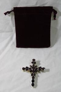 lot 153 image: Jewelry Sterling Silver Garnet gemstone cross. Marked 925. 2.25L w storage pouch. Garnets tested.