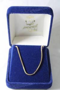 lot 169 image: Jewelry 14K yellow gold box chain necklace. Marked 14K RVL. 16L