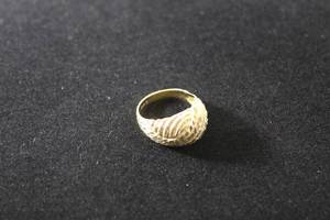 lot 183 image: Jewelry 14K yellow gold laser cut dome ring. Marked 14K. Size 7