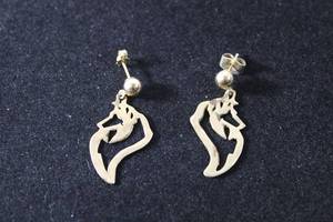 lot 185 image: Jewelry 14K yellow gold poststud silhouette negative space earrings. Marked 14K.
