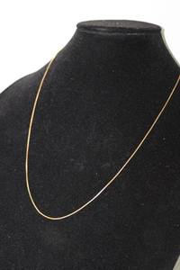 lot 192 image: Jewelry 10K yellow gold box chain necklace. Marked 750 and  Una-A-Erre on separate gold makers tag. 23L