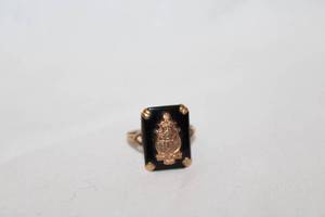 lot 199 image: Jewelry 10K yellow gold 1944 Tau Delta Eta womens fraternity ring. Marked 10K. Size 5 Black glass top and slightly bent shank