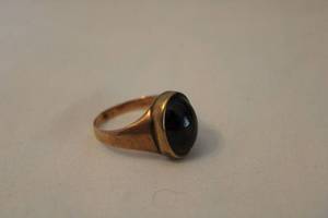 lot 301 image: 10K yellow gold ring with red glass dome top and solid gold undermount. Likely antique Victorian. Marked 10K. Size 8.5. red glass dome is abraded.