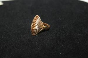 lot 330 image: 14K yellow gold ring with textured ribbed top. Marked 14K IG (Imperial Gold). Size 7