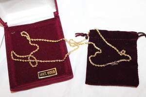 lot 333 image: 14K yellow gold rope chain necklace. Marked 14K. 25L