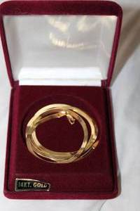 lot 335 image: 14K yellow gold serpentine necklace. Marked 14K Italy. 20L