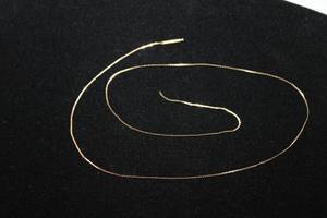 lot 340 image: 14K yellow gold serpentine s-link necklace. 18L  Needs clasp, no markings.