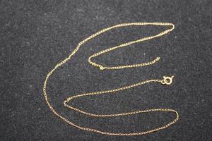 lot 342 image: 14K yellow gold cable chain necklace. Marked 14K. 16L (Needs reattached)