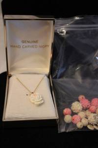 lot 354 image: Carved natural and Pink dyed bone beads and bone disc spacers. Also includes a carved Ivory 12K Gold Filled in original box.