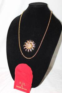 lot 376 image: Signed Kenneth J Lane 26L necklace with detachable KJL sunflower pendantpin. In KJL pouch