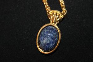 lot 377 image: Signed Kenneth J Lane 30L necklace with detachable KJL Egyptian Revival Khepri carved Sodalite scarab double sided pendantpin. In KJL pouch