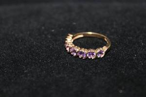 lot 389 image: 10K yellow gold Amethyst gemstone S-top ring. Marked 10K. Size 7. Amethysts tested