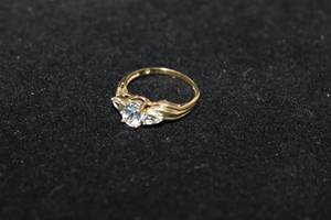 lot 386 image: 10K yellow gold Tourmaline gemstone ring. Marked 10K C.J.C.. Size 7.25. Gemstone tested as Tourmaline but please verify at preview.