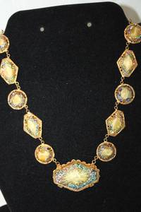 lot 392 image: Vintage 12K Gold Filled glass Carnival or confetti station necklace. Marked 12K GF on sister clasp. 14L. Unusual necklace.