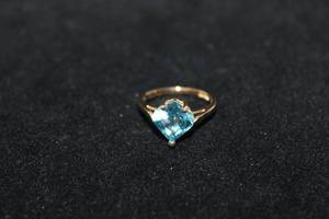lot 369 image: 14K yellow gold Plumb London Blue Topaz ring. Marked P 14K. Topaz tested. Size 7