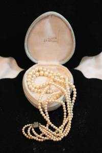 lot 417 image: Culture graduated multi strand pearl necklace with decorated box clasp. Opening 13L with heart shaped vintage box