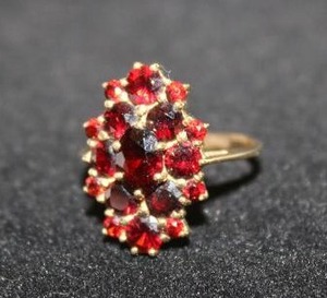 lot 423 image: 14K yellow gold Garnet cluster ring. Marked 14K Size 7.25 Garnets tested