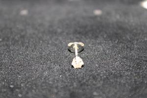 lot 428 image: 14K White Gold and Diamond vintage screw back stud earring. Marked 14K. Diamond tested. Approx 14 carat. Needs cleaning