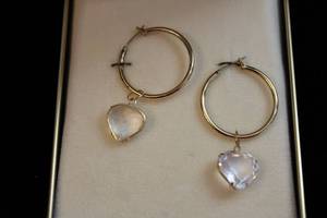 lot 432 image: Gold plated Hoop earrings with crystal heart form dangles. In a Morgan Fairchild box. More Morgan Fairchild available in Lot 158