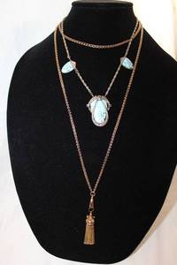 lot 433 image: Vintage elaborate tassel pendant on 44L Bismarck link chain necklace. No markings. Unusual. Also includes an art deco ceramic 18L station necklace. (One piece needs reattached, glue residue on reverse)