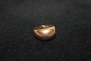 lot 449 image: 14K yellow gold dome top ring. Marked 14K EG. (Eterna Gold). Size 7