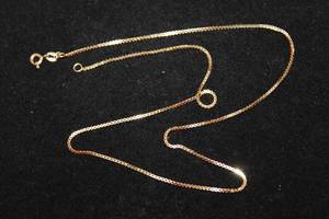 lot 450 image: 14K yellow gold box link chain necklace. Marked 14K RVL. 18L