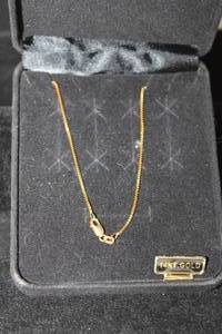 lot 447 image: 14K yellow gold box chain necklace. Marked 14K Italy Milor. 24L In box.