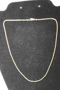 lot 453 image: 14K yellow rope chain necklace. Marked 14K. Tube clasp w safety catch. 16L