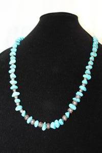 lot 455 image: Sterling Silver and Turquoise necklace. Silver bead spacers. Fish hook clasp. 28L
