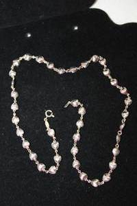 lot 463 image: Sterling Silver heart form link chain necklace. Marked 925 Made In Italy. 18L