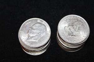 lot 208 image: Coins (20) 1971 Eisenhower Dollar Coins. Bid is times the quantity