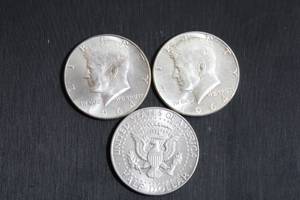 lot 242 image: Coins (3) 1964 Kennedy Half Dollars
