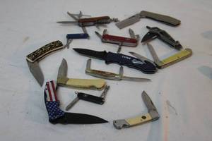 lot 279 image: Pocket Knives Flag knife, Bone handle knife, and more, see pictures