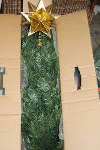 lot 296 image: 4.5 foot pre-lit Christmas tree with gold star topper