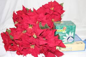 lot 298 image: 6 Red poinsettias bunches, icicle and net lights