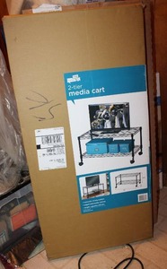 lot 102 image: 2-tier media cart or rolling metro rack SIB, holds up to 350 lbs.