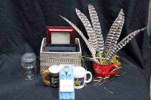lot 247 image: Houseware Oversize mug, Brown and white feathers, ipbuds earbuds still in packaging, vintage salt shaker and wire handle jar