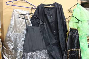lot 253 image: Hairdressers capes and aprons as shown