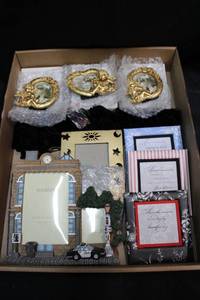 lot 146 image: Police car photo frame, small cherub frames and cutout frame
