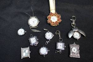 lot 149 image: Ladybug keychain watch, Red crystal flower watch and watch faces