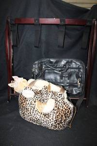 lot 106 image: Wooden luggage stand, laptop bag, reversible small pet carrier bag as shown