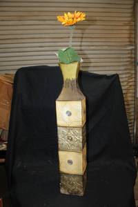 lot 117 image: Metal 3 foot vase with sunflower