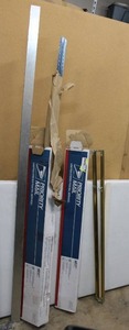lot 127 image: Metal picture framing materials - longest piece is 5.5 feet