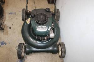 lot 130 image: Lawn Mower Craftsman 21 mulcher 4.5 HP model 917.388272  Working condition unknown.