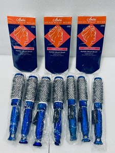 lot 24 image: Lot of 10 - New Head Wraps & Brushes - (3) Andre Head Wrap Wear Terry Twist #2600 - White, (3) New Royal Brushes #172 - Blue & (4) Royal Brushes #173 - Blue