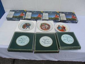 lot 25 image: 3-Collectors Avon Christmas Plates And 4- Boxes Of White Net Lights.